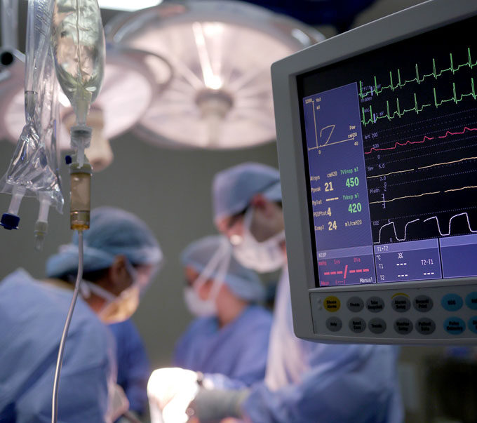 Surgery being performed by trained medical professionals